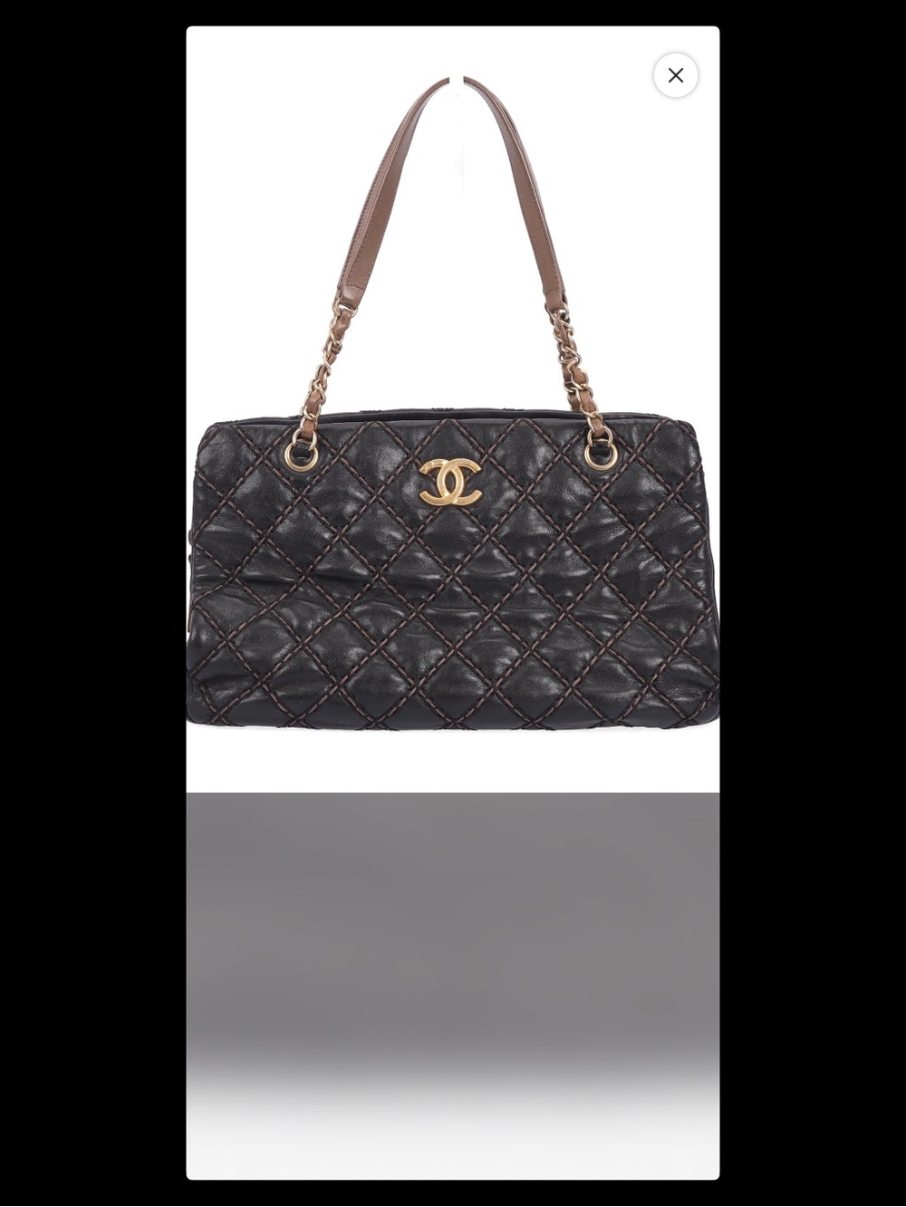 CHANEL Black Quilted Leather Shoulder Bag with Gold Hardware and Tan Straps